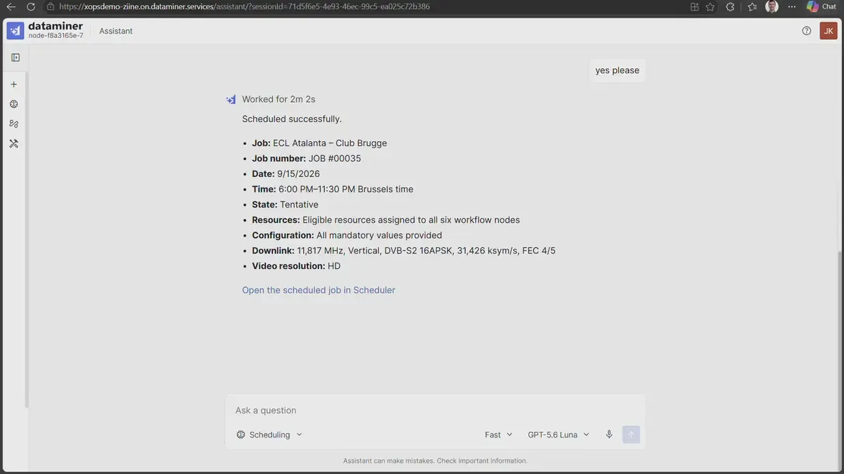 DataMiner Assistant confirming a scheduled job, with date, time, resources and downlink parameters taken from the order.